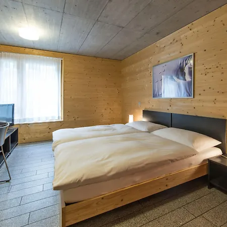 In One - / Swiss Lodge