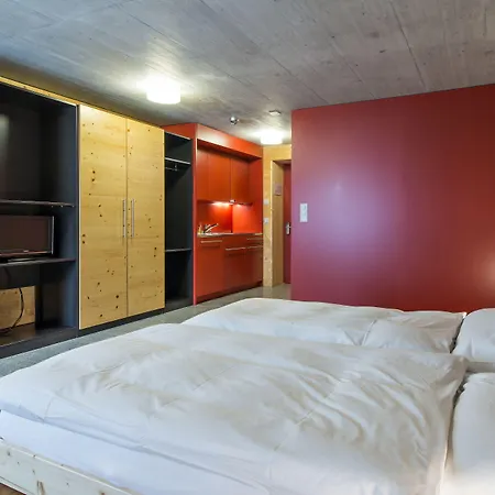 In One - / Swiss Lodge