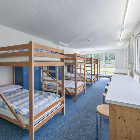 In One - / Swiss Lodge